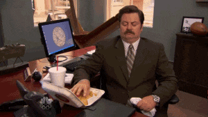 Ron-Swanson-Trying-to-Eat-Burger.gif